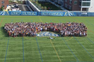 The Class of 2019 accompanied by Charlie the Charger (Photo by Gabriella Pericone/Chariot Yearbook photo)