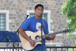 UNH Student Geodann Daguplo played the acoustic guitar during WestFest 