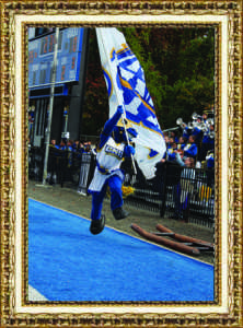 Gabby Pericone, Senior Charlie the Charger North Campus Saturday, Oct. 23, 2015 “Charlie the Charger ecstatically runs with the UNH flag after one of many Homecoming Game touchdowns.” 