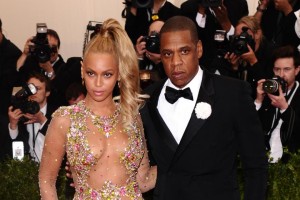 Jay-Z, creator of Tidal, with his wife, Beyonce  (AP photo)