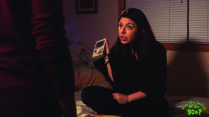 Photo of scene from Are You Afraid of The '90s?, featuring Heather Matarazzo as Jess holding a Gameboy. Photo by Director of Photography Jake Horgan
