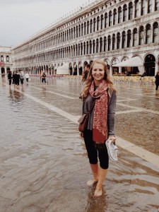 Ashley with shoes in hand to cross through a flooded square in Venice (Photo by Ashley Arminio / Charger Bulletin Photo)