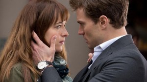 Dakota Johnson and Jamie Dornan appear in a scene from Fifty Shades of Grey (AP Photo)