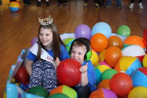 Photo of Aly and Colin playing in the ball pit at UNH’s first ever ChargerTHON. The event was made possible with the support of many people and organizations. ChargerTHON ran from April 17-18, 11 p.m. until 11 a.m., where students danced all night for kids who can’t, while fundraising for a Children’s Miracle Network Hospital.  P. 2